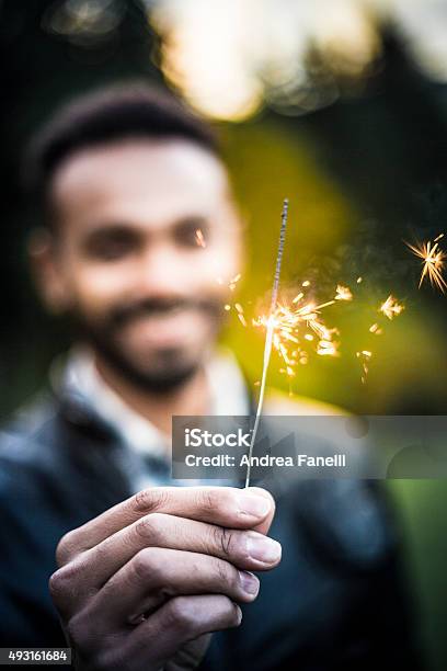 Boy Whit Sparkler Stock Photo - Download Image Now - 2015, Adult, Adults Only