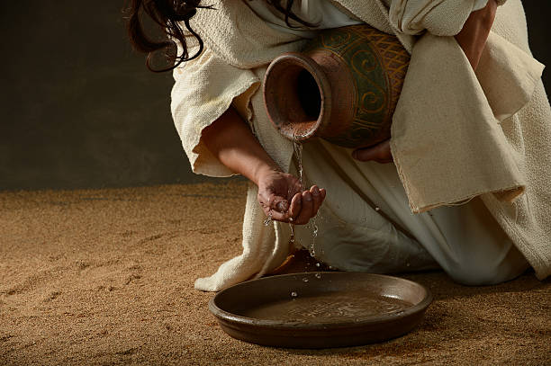 istock Jesus pouring water 493163324