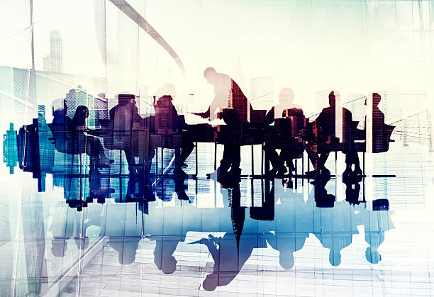 abstrakte bild von business people silhouettes in einem meeting - meeting community board room leadership stock-fotos und bilder