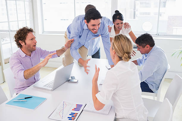 istock Executives fighting with businessman in mediation at office 493175645