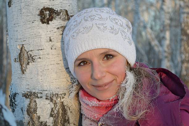 istock Beautiful girl in winter birch forest 493176595