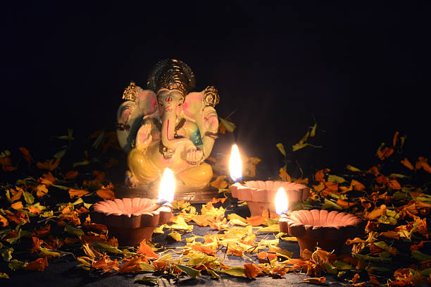istock Clay diya lamps lit during diwali celebration. Greetings Card. 493181626