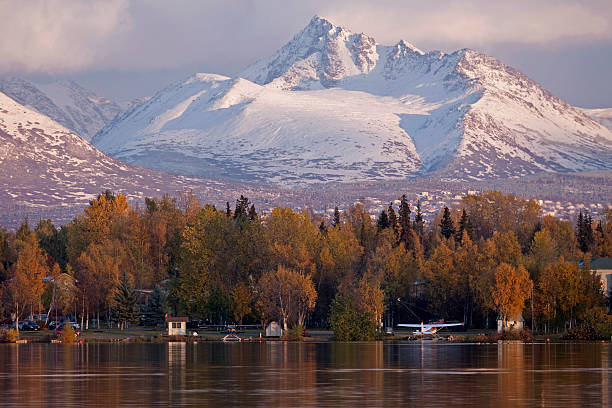 Anchorage Autumn O'Malley Peak looms over Anchorage, Alaska's, Lake Hood on a fall day. chugach mountains photos stock pictures, royalty-free photos & images