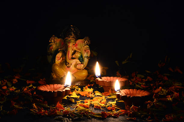 istock Clay diya lamps lit during diwali celebration. Greetings Card. 493182742