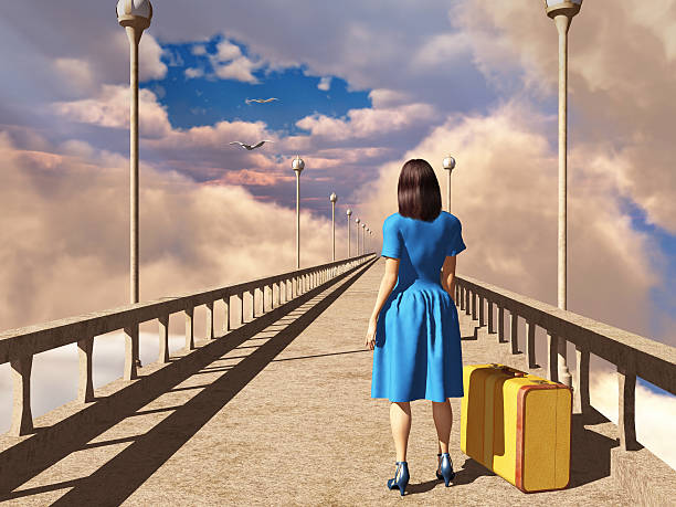 istock Woman with a suitcase on a bridge 493185166
