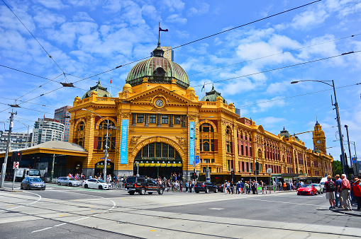 Melbourne, Australia - January 18, 2015: View of iconic Flinders Street Station in a sunny day in Melbourne city cetre on January 18, 2015.