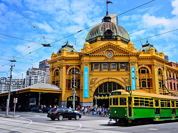 Flinders Street Station and a vintage tram in Melbourne stock photo