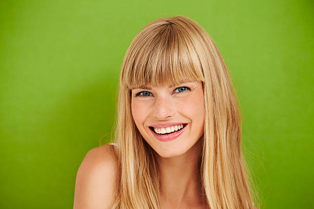 istock Blue eyed model on green 493190396