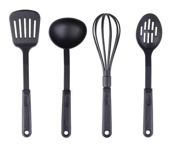 kitchenware de plástico negro - utensilio para servir fotografías e imágenes de stock