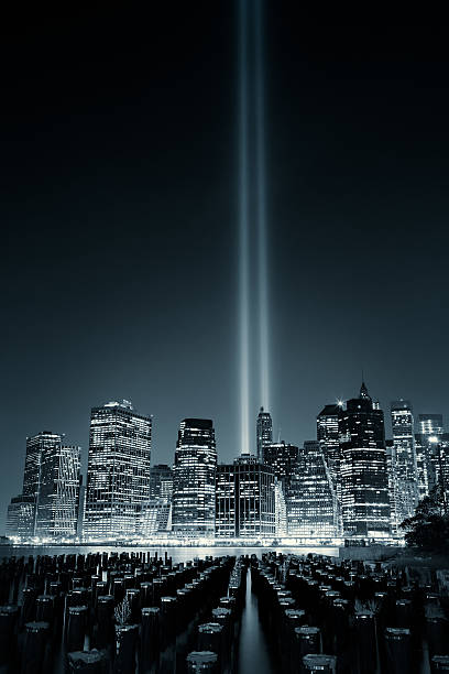 istock Lower Manhattan skyline night view from Brooklyn Bridge Park 493190554