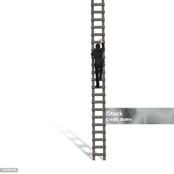 Rear View Of Businessman Climbing On Wooden Ladder Stock Photo - Download Image Now - Ladder, Clambering, Men