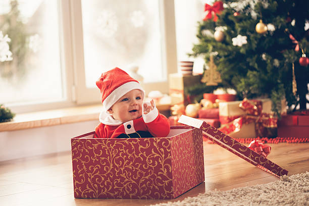 istock Baby boy in a Christmas box 493192486