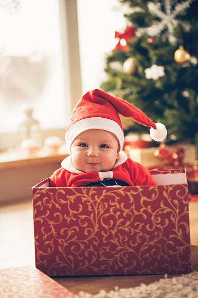 istock Baby boy in a Christmas box 493192530