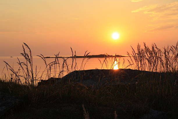 в lofoten midnight sun - midnight sun стоковые фото и изображения