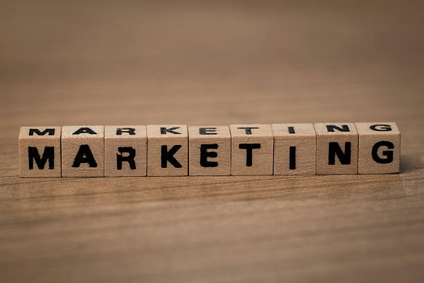 istock marketing in wooden cubes 493193722