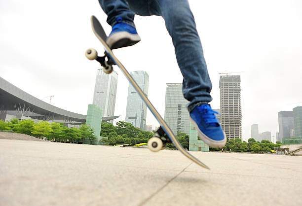 istock woman skateboarding in the ctiy 493200083