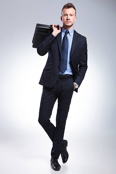 istock business man with suitcase on shoulder 493200349
