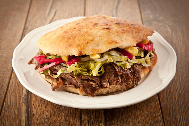 Doner Kebab - grilled meat, bread and vegetables shawarma sandwich stock photo