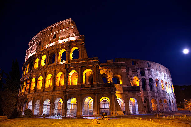 istock Coliseum Overview Moon Night Rome Italy 493203519