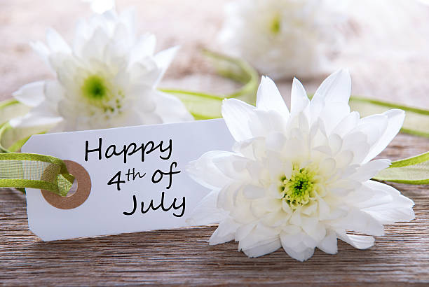 istock White Flowers with Happy 4th of July 493205333