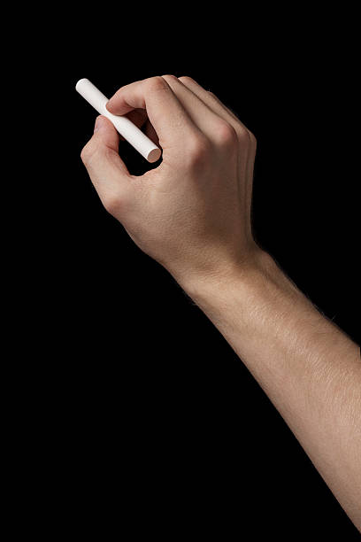 adult man hand to draw something with chalk
