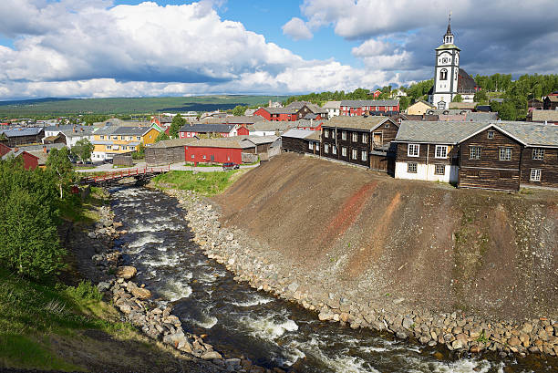 View to the copper mines town of Roros, Norway. Roros, Norway - June 24, 2013: View to the copper mines town of Roros in Roros, Norway. Roros town is declared a UNESCO World Heritage site. roros mining city stock pictures, royalty-free photos & images