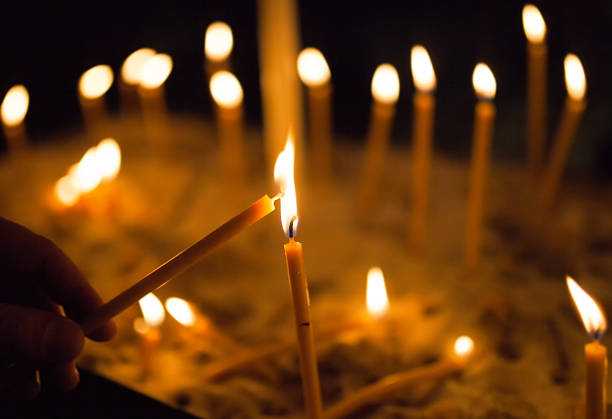 istock Light a Candle in the church 493209930
