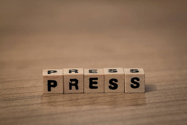 istock Press in wooden cubes 493212292