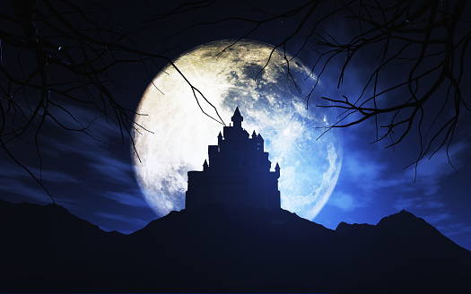 Light glows from a haunted house perched at the edge of a cliff in front of a large moon on a dark and spooky Halloween night.