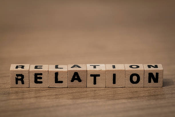 istock relation in wooden cubes 493215750