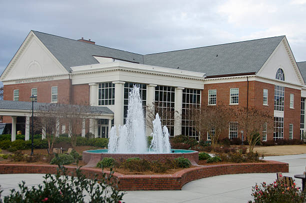 Student Life Center at the University of North Carolina Wi The campus of the University of North Carolina Wilmington has a stately air, with buildings of red brick, gardens spread throughout and a few fountains, as well. The Herbert and Sylvia Fisher Student Center is no exception. university of north carolina stock pictures, royalty-free photos & images
