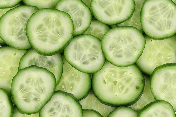 istock Close up fresh green sliced cucumber. 493219787