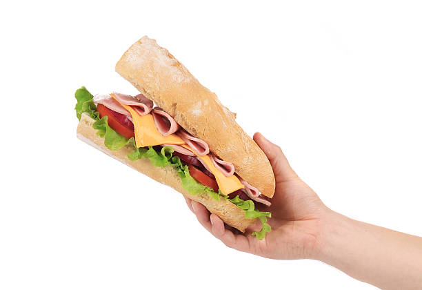 Big fresh sandwich in hands.