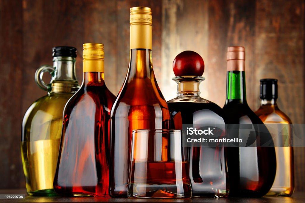 Bottles of assorted alcoholic beverages Bottles of assorted alcoholic beverages. Alcohol - Drink Stock Photo