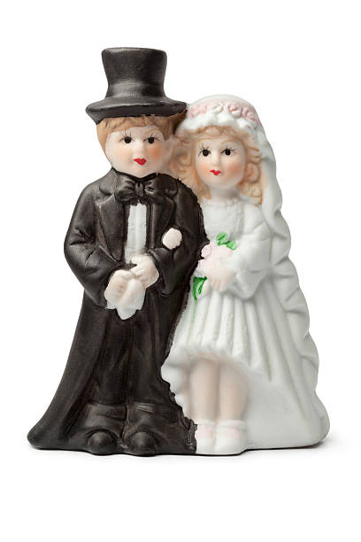 istock Old plaster bride and groom cake topper 493221121