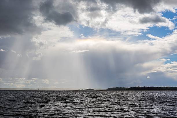 istock Stormy lake landscape with yachts on water. 493221518