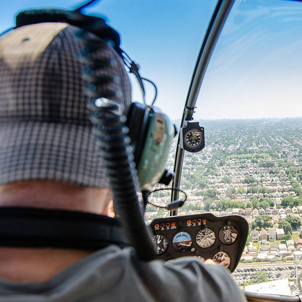 istock Helicopter Pilot over the chicago skyline 493221875