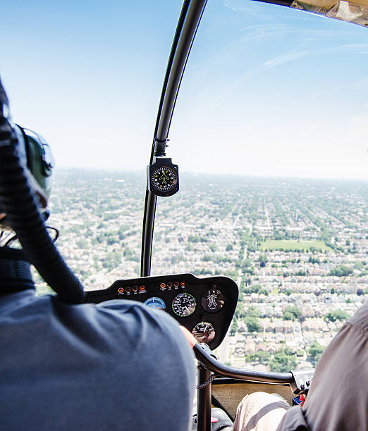 istock Helicopter Pilot over the chicago skyline 493222201