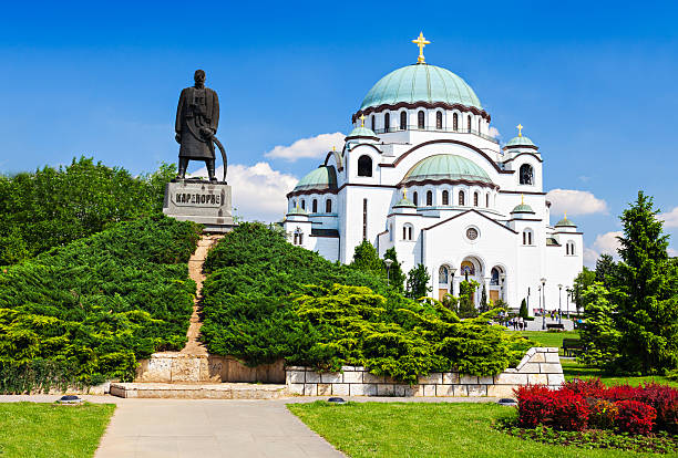 sava cattedrale e karadjordje statua - river sava foto e immagini stock