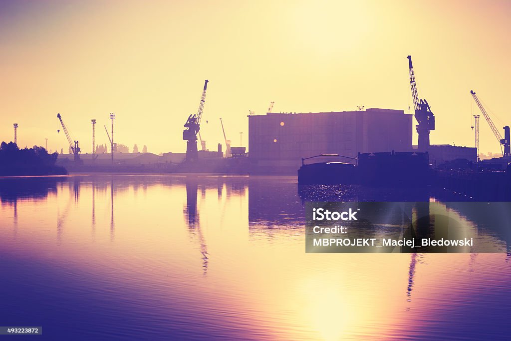 Vintage toned harbor at sunset, Szczecin in Poland. 2015 Stock Photo