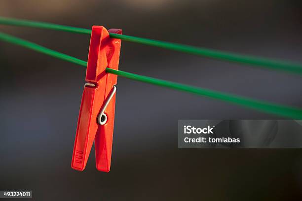 Single Red Clothes Peg Stock Photo - Download Image Now - Abstract, Cable, Clamp