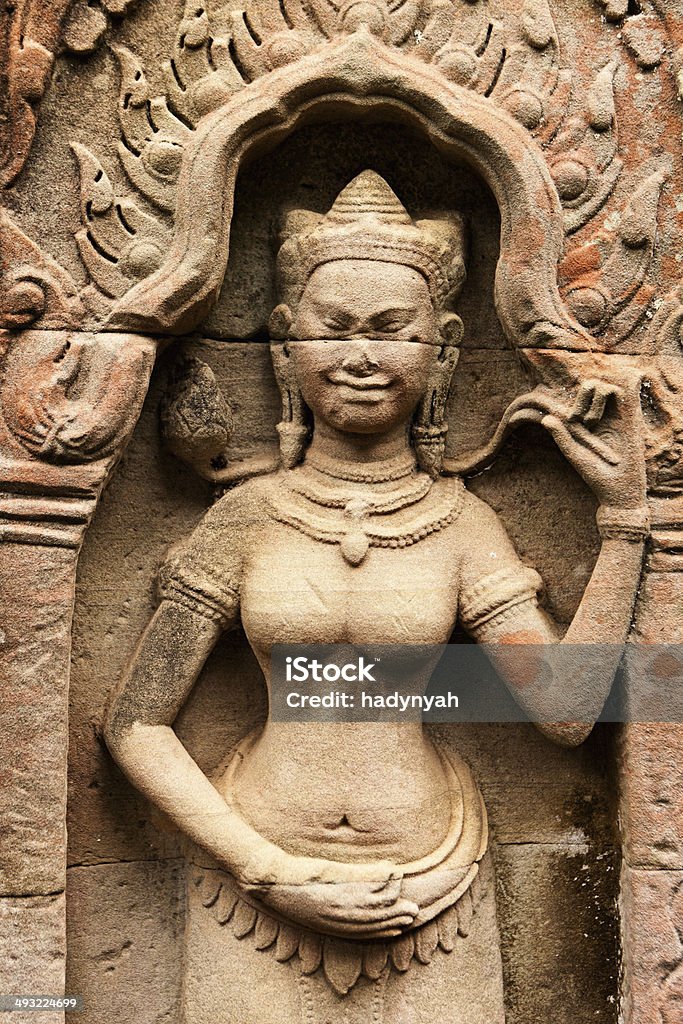 Sculpture of Apsara Dancer at Angkor Wat Sculpture of Aspara Dancer, Angkor Wat, Cambodia. Adults Only Stock Photo
