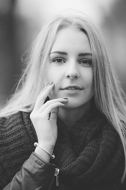 istock Young woman with autumn leaves on the head. 493224766
