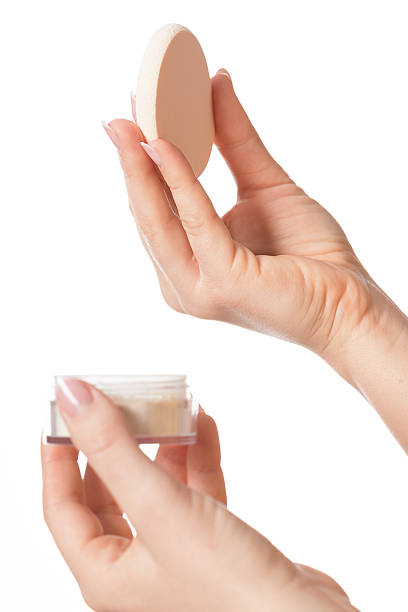 istock Woman applying powder 493224791