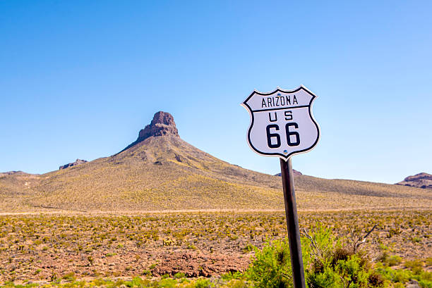 Arizona Route 66 Sign Route 66 sign on Oatman Road in rural Arizona route 66 stock pictures, royalty-free photos & images