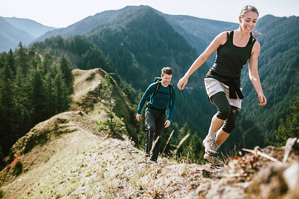 istock Fit Mature Adults on Mountain Hike 493236762