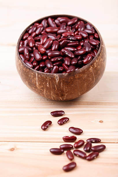 istock Red beans in wooden bowl 493242762