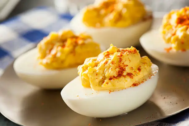 Healthy Deviled Eggs as an Appetizer with Paprika