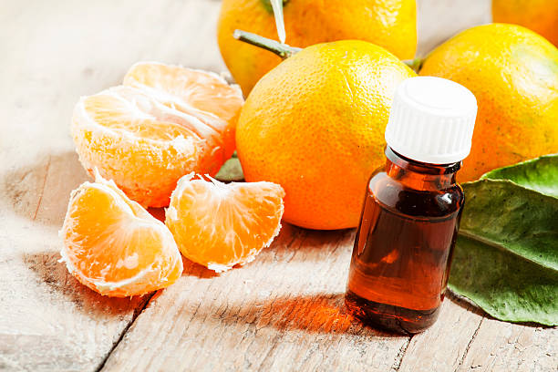 istock Aromatic tangerine oil, with tangerines 493244452