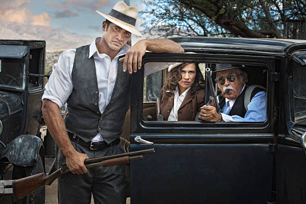 istock 1920s Era Gangsters with Woman 493244485